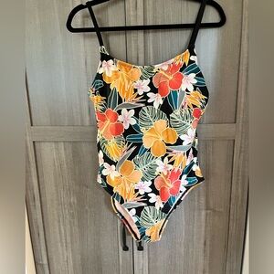 Flowered, one piece, Hurley brand swim suit.